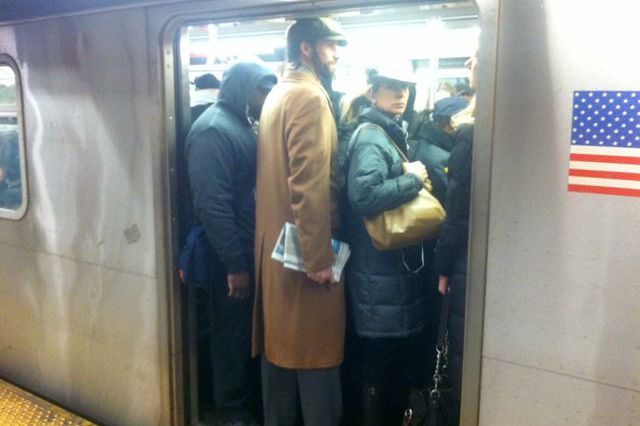 A stuffed subway car this morning